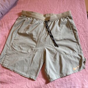 Nike Stride men's Dri-FIT 7" brief-lined running shorts sz S in jade horizon